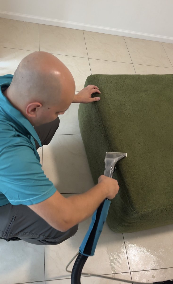 Extracting a green sofa cushion